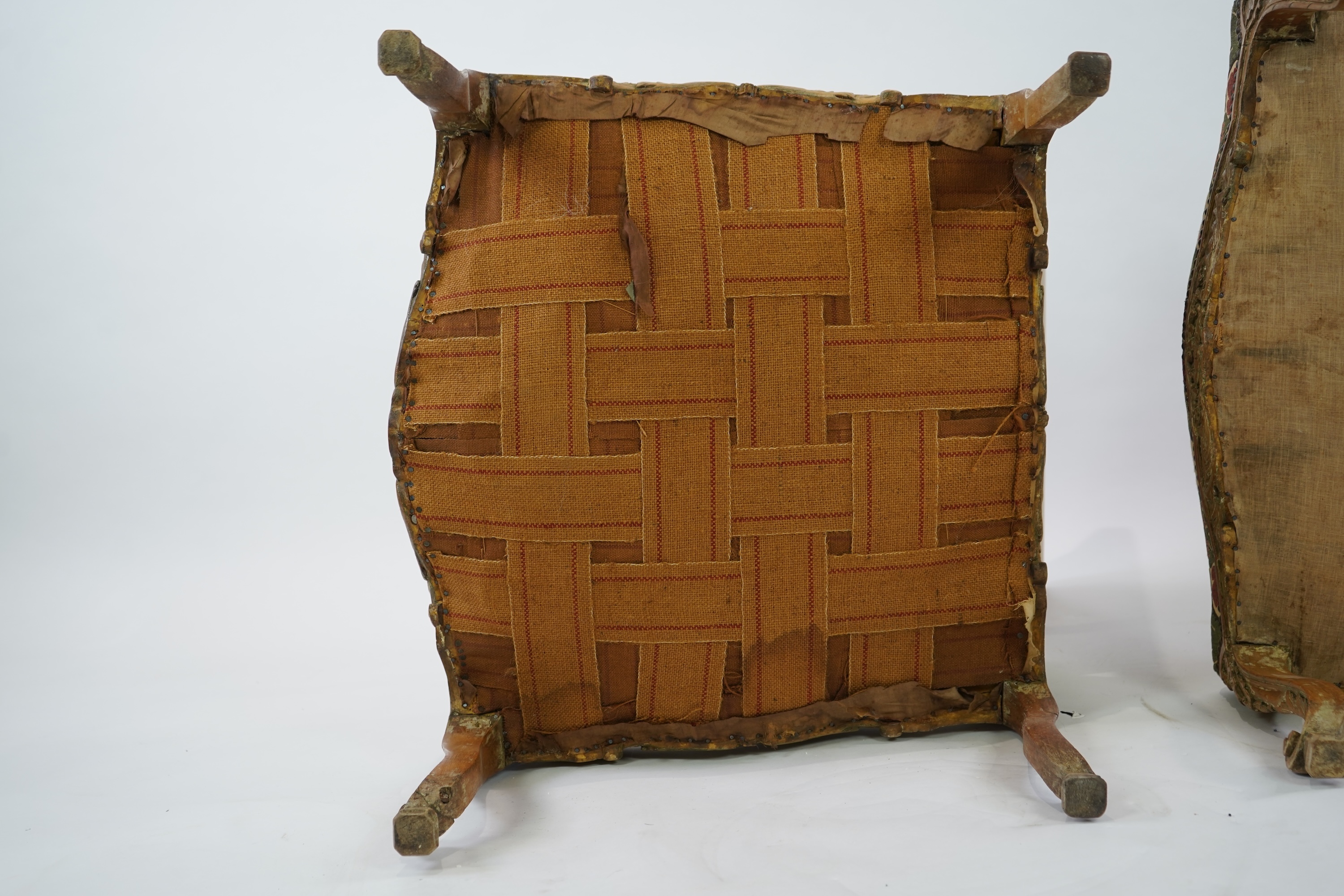 A pair of 19th century Louis XV style carved walnut grand fauteuil